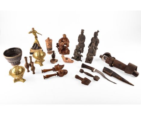 A collection of decorative items including copies of the terracotta warriors, a silver topped flask in a leather pouch, Roman