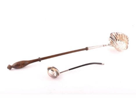 Two silver ladles, including a Georgian silver toddy ladle with ebonised wood handle, indistinct date mark, possibly 1800, ov