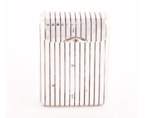Folding silver cigarello case, reeded silver body that folds out to reveal four gilded compartments, set with a sugarloaf cab