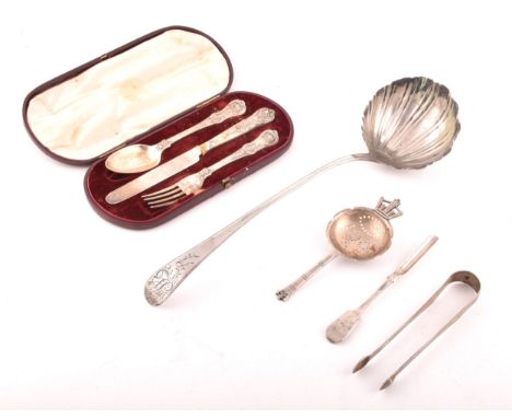 A group of assorted silver items, including a Georgian silver ladle with round shell bowl, old English pattern, engraved init