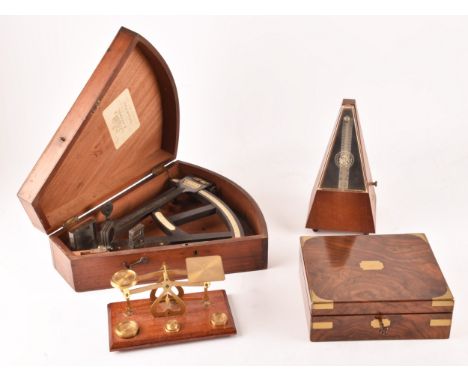 An H Hughes of Fenchurch street sextant in fitted mahogany box, together with a walnut cased draftsman's drawing set with fit