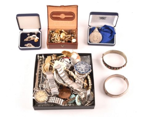 A group of assorted objects, including a Longines Conquest automatic wristwatch, along with four other wristwatches, several 