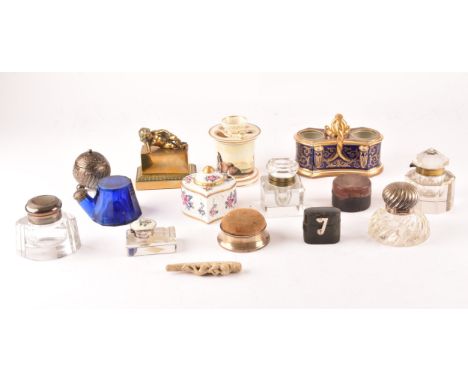 A collection of various inkwells, including a flight Barr and Barr Worcester inkwell of Malvern church, silver topped inkwell