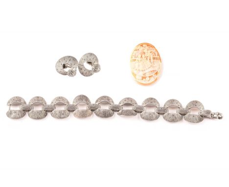 A German Art Deco silver and marcasite bracelet by theodor fahrner, 17.5cm length, along with a pair of matching earrings, to