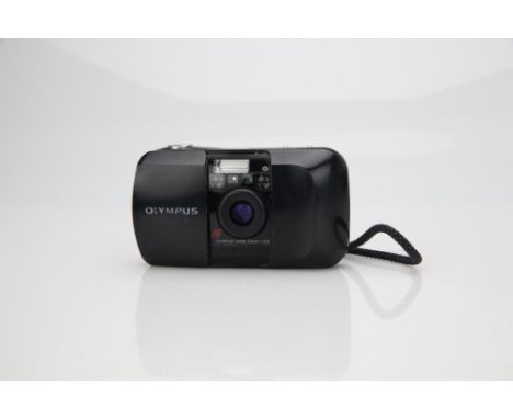 black, body P-F, camera will not fire. Lens moves forward when clamshell is opened. Makes winding noise when camera is closed
