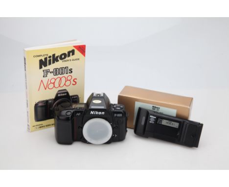 black, body G, shutter working, with Nikon MF-21 controll back and a book entitled 'Complete Nikon User's Guide - F-801s'