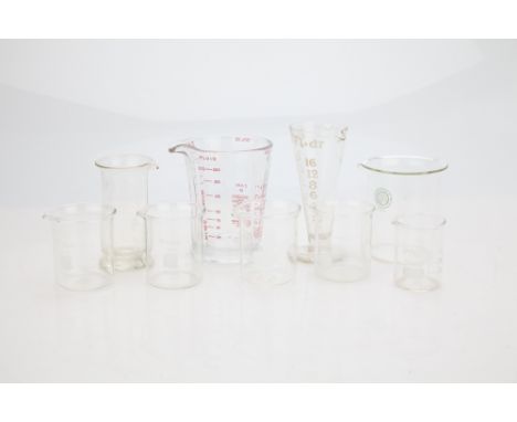 9 pieces in total, some with ml scales others with fl.oz scales.