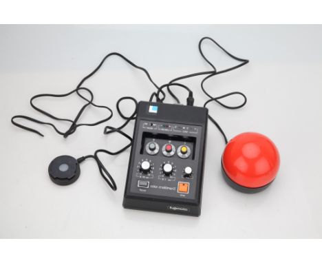 black, missing mains plug, with sensor and safe light attachments. Untested.