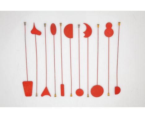 three sets, with a good range of tool shapes and sizes. One factory-made set and two homemade. One of which is deconstructed.