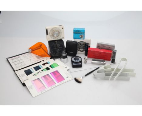 including a complete Kodak Color Print Viewing FIlter Kit, Gosen Bisix II light meter, a Taylor-Hobson process prism, a Nikor
