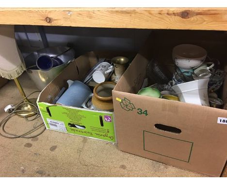 A lamp and two boxes of plates, vases etc.