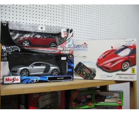 Two Boxed 1:18th Scale Diecast Model Cars - Hotwheels #B6048 Mini Cooper Cabrio, Maisto #46629 Audi R8; together with a boxed