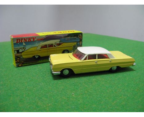 Hong Kong Dinky Toy No. 57/003 Chevrolet Impala, white roof/yellow body/red interior. Overall very good plus. Boxed, tear to 