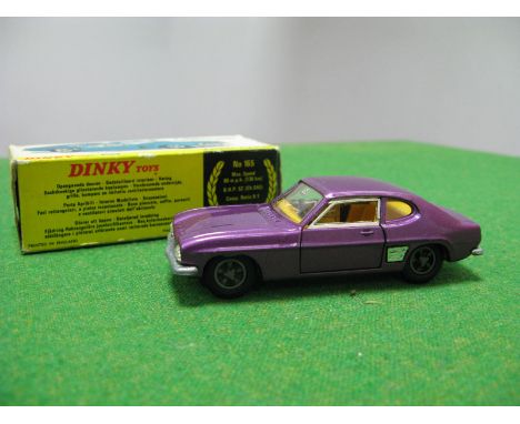 Dinky Toys No. 165 Ford Capri, purple, very good, slight chipping to one side raised edges. Boxed, crushing/tear to box.