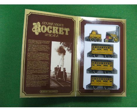 Hornby "OO" Scale Model of Stephensons "Rocket" Locomotive and Three Coaches. boxed in original packing.