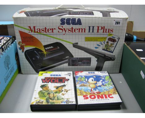 A Boxed Sega Master System II PLus Games Console (Circa 1990), including boxed Sega Light Phaser gun, Sega Arcade Game Operat