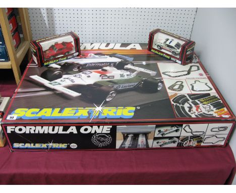 A boxed Scalextric Formula One Racing Set, including one Brabham, one Williams, track, unchecked, a boxed scalextric #C362 Ro