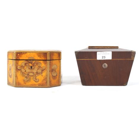 A late Victorian mahogany veneered money box and a tea caddy. The money box in the form of a sarcophagus shaped tea caddy, wi