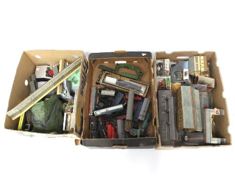 A large collection of 00 gauge model railway related items. Including locomotives and carriages, some by Tri-ang, scenary etc