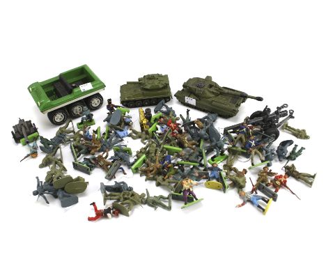 An assortment of model soldiers. Including Britains detail, together with two dinky toys tanks, one being a Chieftain