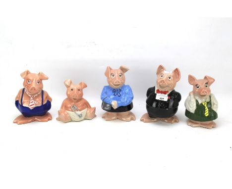 Five Wade Natwest pigs. Represting father, children and baby, largest H18cm