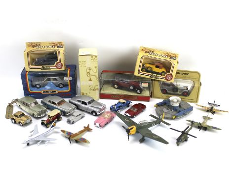 An assortment of die cast model vehicles, planes and cars. Including Dinky Junkers ju 87 B, Dinky Rolls Royce Phantom V etc