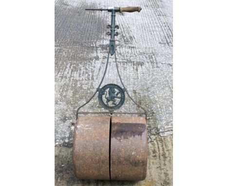 A cast iron roller marked Cater Stoffell &amp; Fortt Ltd of Bath