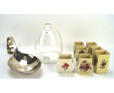 Seven Royal Doulton miniature vases and other items. The vases printed with flowers and with printed green marks, a large sil