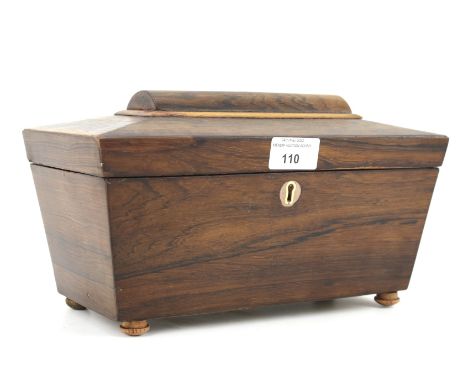 A 19th century rosewood veneered tea caddy of sarcophagus form. Opening to reveal three lidded compartments, L27cm