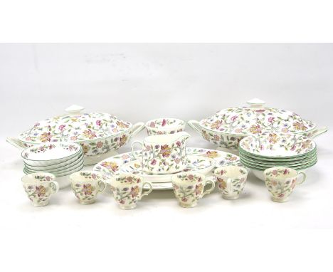 A Minton 'Haddon Hall' six setting part dinner service decorated with flowers with green rims. Condition Report: Overall in g