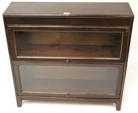 A glazed and stained early 20th century bookcase. In the Globe Wernicke style with two tiers in sizes, bearing 'Gunn Bookcase
