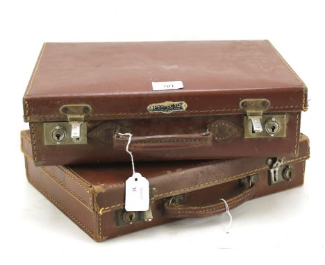 Two 1930s child's suitcases containing an assortment of early 20th century playing cards. With Bezique and an assortment of e