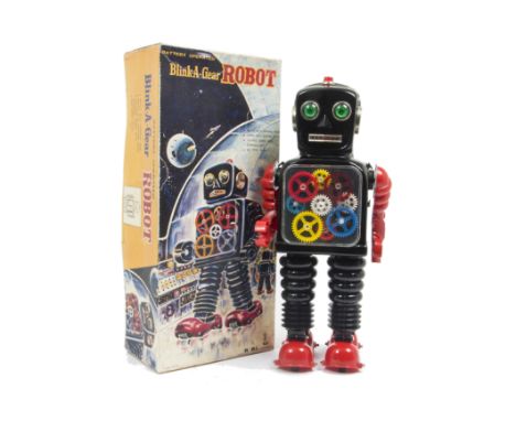 A Taiyo (Japan) Battery-operated Blink-A-Gear Robot, large tinplate and plastic robot, black body, red plastic arms and feet,