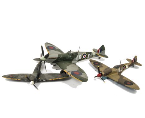 Three Large-scale RAF Spitfire model Aeroplanes, two appear in solid wood/resin and largest in light wood with tissue/canvas 