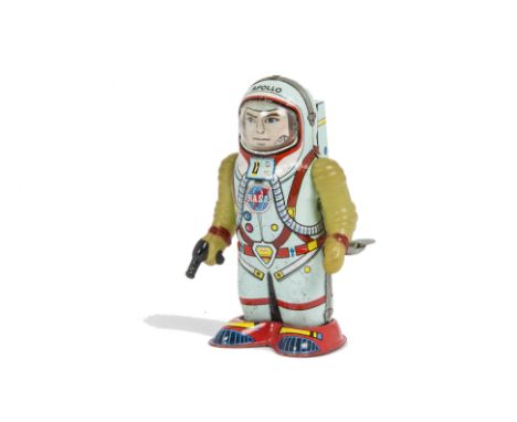 A Shudo (Japan) Clockwork Astronaut, light blue tinplate body, 'NASA' logo to chest, 'Apollo' on helmet, rubber arms, G-VG, s