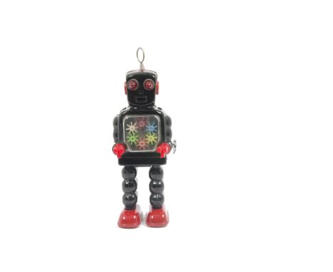 A Yoshiya K.O (Japan) Clockwork High Wheel Robot, black tinplate body, red hands and feet, six gear version, fixed key motor,