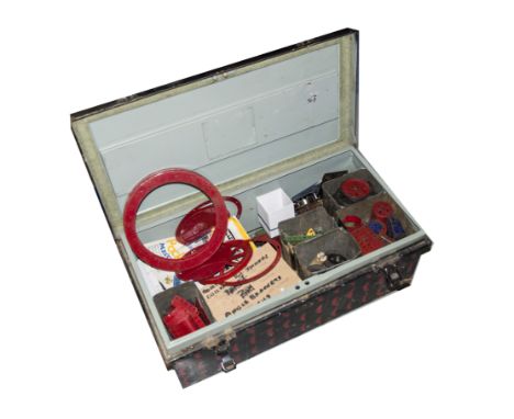 A Large Metal Trunk of 1950s Meccano, mainly 1950's red and green, some later blue and yellow, gears, wheels, angles, chains 