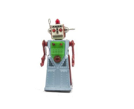 A Yoshiya K.O (Japan) Battery-operated Chief Robotman, light blue tinplate body, red tinplate arms, green plastic chest panel