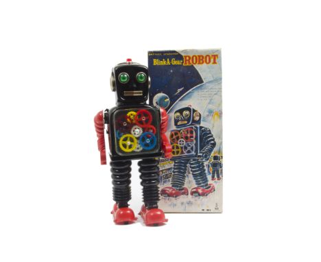 A Taiyo (Japan) Battery-operated Blink-A-Gear Robot, large tinplate and plastic robot, black body, red plastic arms and feet,