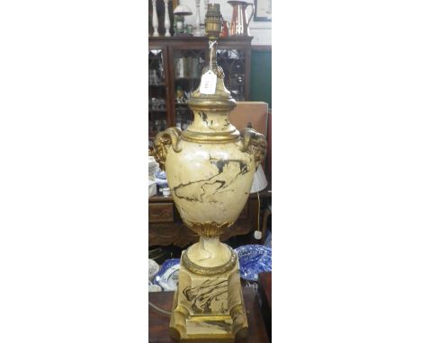 A MARBLED TABLE LAMP in the form of an urn with ram's head handles, 61cm high (plus fitting) and another lamp