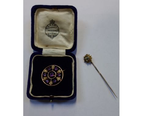 AN AMETHYST AND SEED PEARL CIRCULAR BROOCH, together with a stick pin