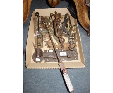  A COLLECTION OF VINTAGE IRONMONGERY to include French window shutter stays, bolts and other items