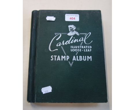 A VINTAGE CARDINAL STAMP ALBUM, containing 19th century and later stamps from around the world