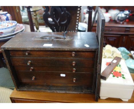 A VINTAGE WOODEN PORTABLE TOOL CHEST, fitted four drawers, a jewellery box and a spirit level