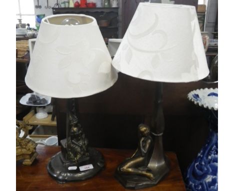 A FRENCH ART DECO STYLE BRONZED SPELTER LAMP with a reclining nude woman and another similar