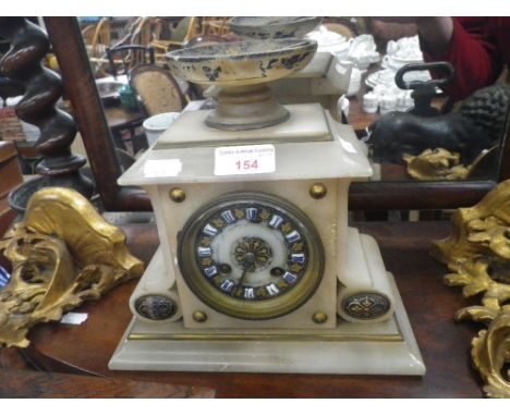 A VICTORIAN ALABASTER MANTEL CLOCK with French movement striking on a bell (examine)