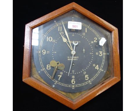 A US NAVY WALL CLOCK, by the 'Chelsea Clock Co Boston' ser. no. 23387E in a later wooden case