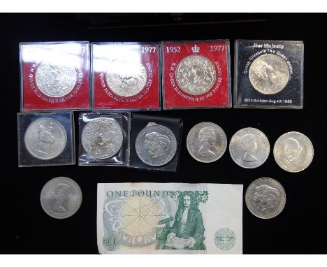 A COLLECTION OF CROWNS and an old pound banknote in a vintage tin