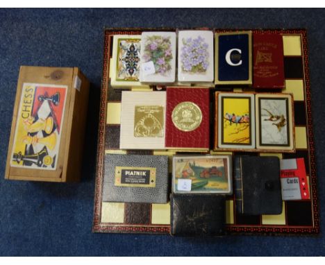 A CHESS SET (boxed) with board and a collection of Vintage playing cards
