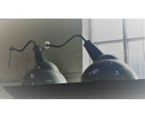 A PAIR OF LARGE INDUSTRIAL WALL MOUNTED LAMPS with domed shaped grey enamel shades, 48cm diam